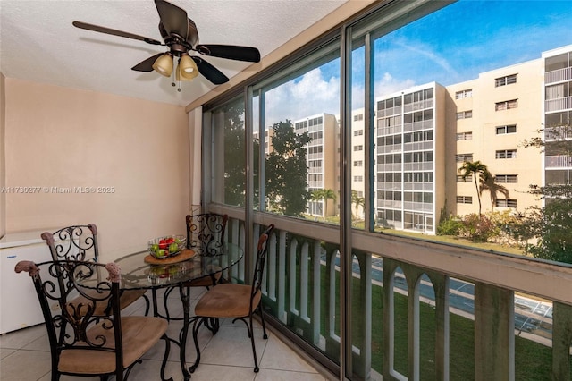 balcony featuring ceiling fan