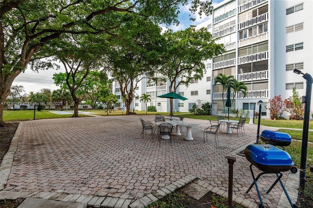 view of property's community with a patio