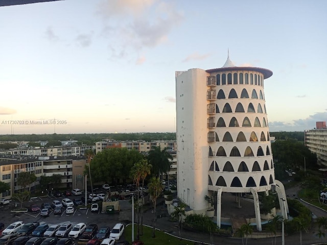 view of outdoor building at dusk