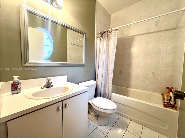 full bathroom featuring toilet, vanity, shower / tub combo, and tile patterned flooring