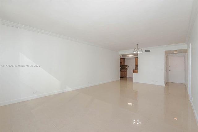 tiled empty room with ornamental molding and a notable chandelier