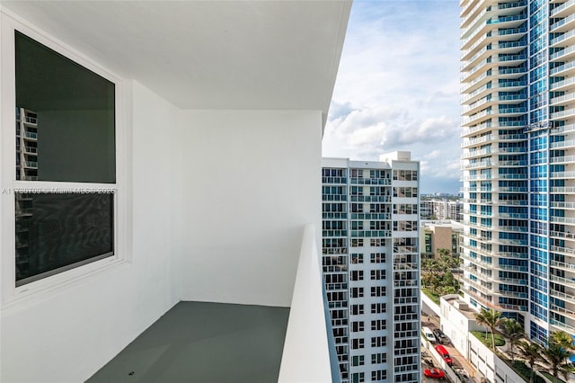 balcony featuring a city view