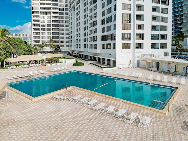 community pool with a patio