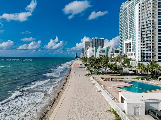 view of water feature with a beach view