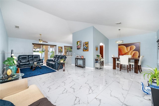 living room featuring vaulted ceiling and ceiling fan