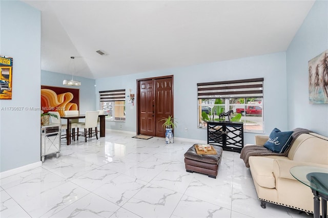 living room with vaulted ceiling