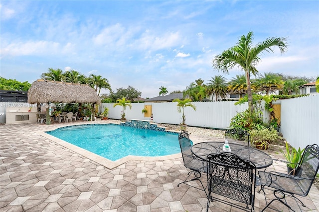 view of swimming pool featuring a patio area and a gazebo