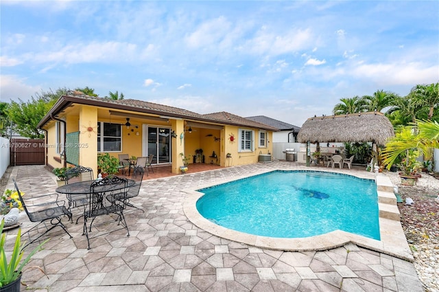 view of swimming pool with a patio area and a gazebo