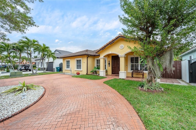 view of front of home with a front yard