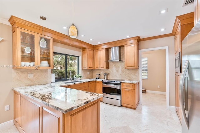 kitchen featuring pendant lighting, light stone counters, kitchen peninsula, stainless steel appliances, and wall chimney exhaust hood