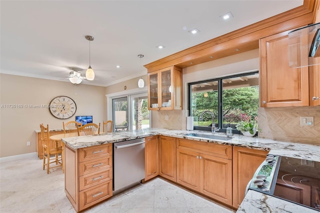 kitchen with tasteful backsplash, sink, stainless steel appliances, and kitchen peninsula