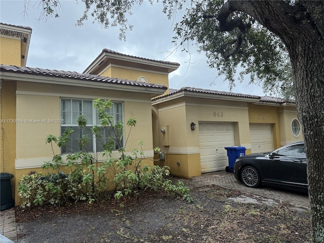 view of side of home with a garage