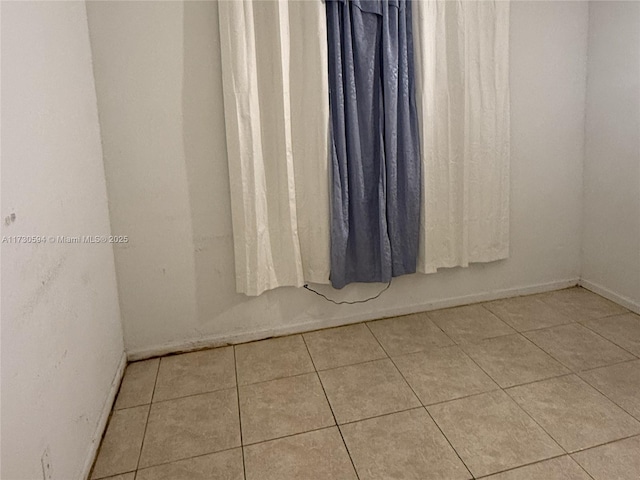 view of tiled empty room