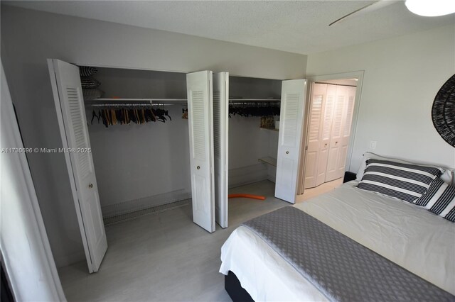 bedroom with two closets