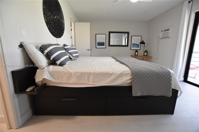 bedroom with a wall mounted air conditioner