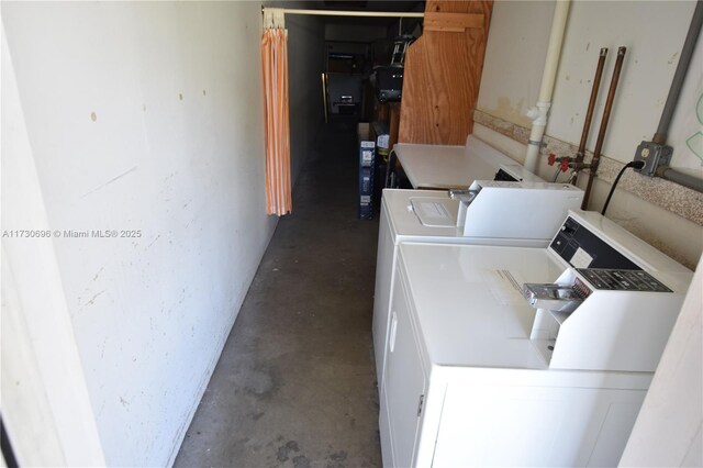 washroom with independent washer and dryer