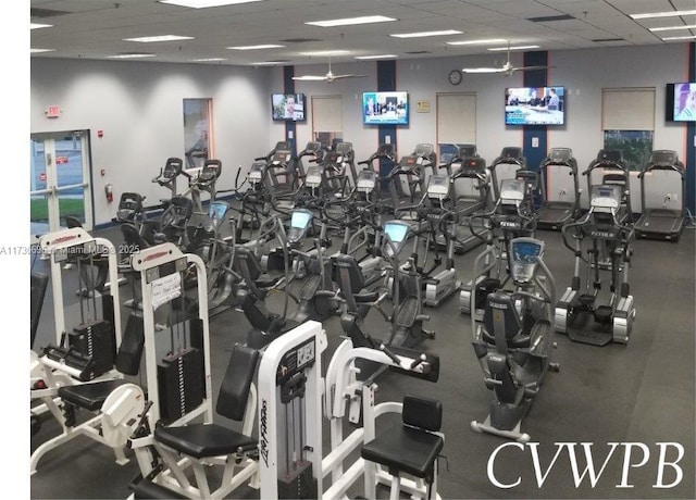 workout area featuring a paneled ceiling