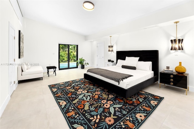 bedroom featuring access to outside and lofted ceiling