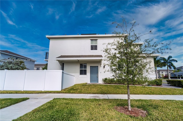 view of front of house with a front yard