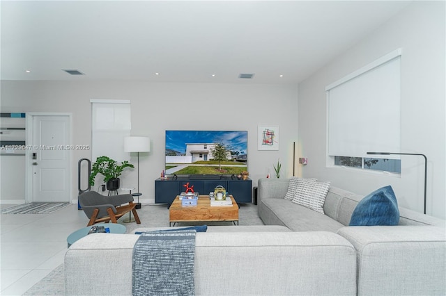 living room with light tile patterned floors