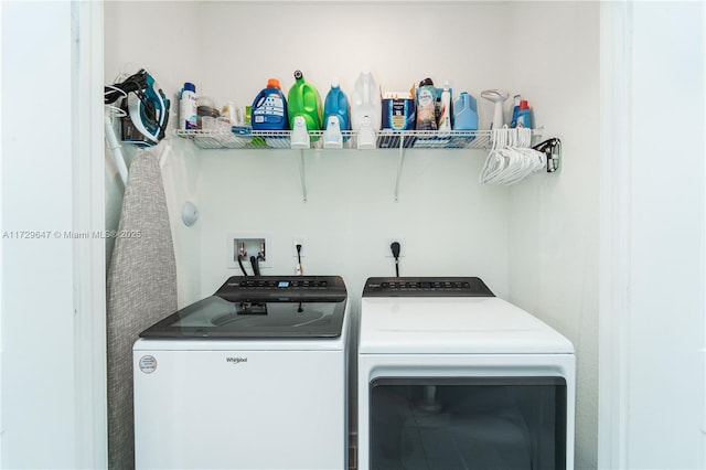 washroom featuring washer and dryer