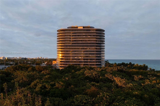 view of building exterior featuring a water view