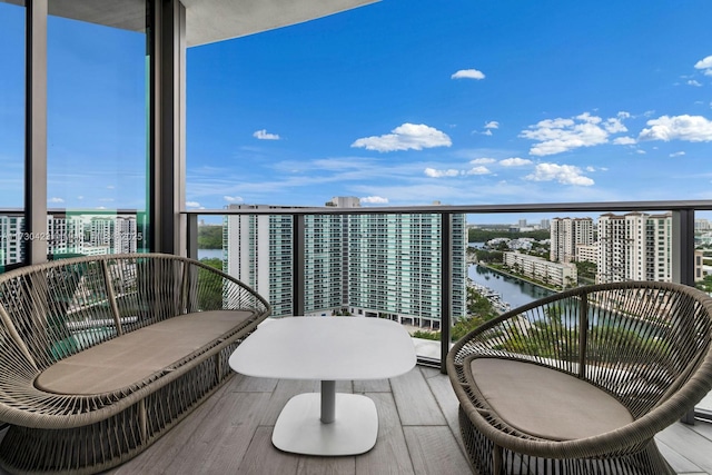 balcony featuring a water view