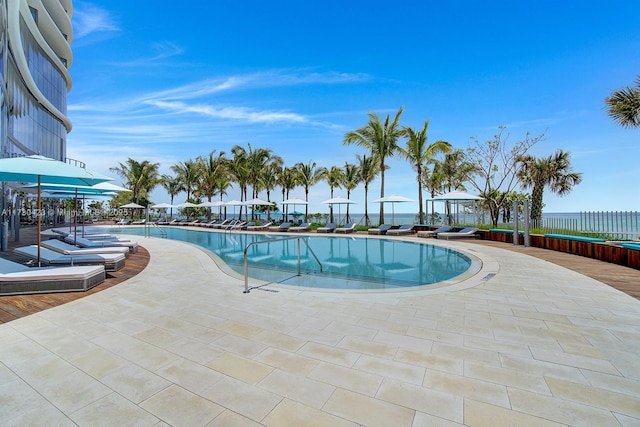 view of swimming pool featuring a patio area