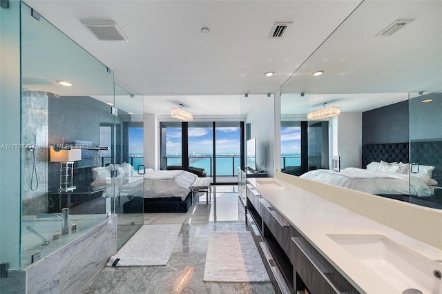 bathroom with an enclosed shower and vanity