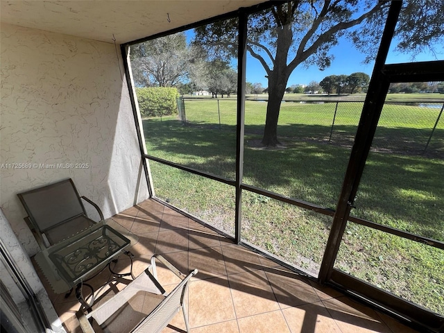 3300 W Rolling Hills Cir Unit 102, Davie, FL 33328 - unfurnished sunroom featuring healthy amount of natural light
