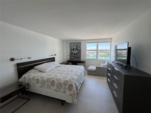 bedroom featuring light tile patterned flooring