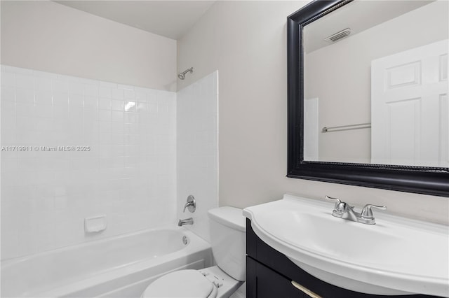 full bathroom with vanity, toilet, and shower / tub combination