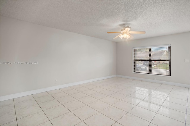 unfurnished room featuring ceiling fan, a textured ceiling, and light tile patterned flooring