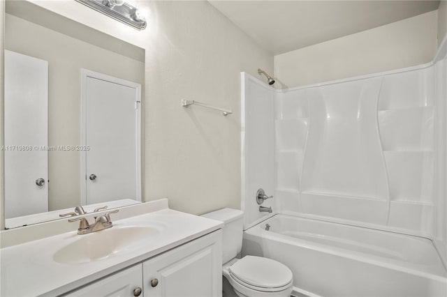 full bathroom with vanity, toilet, and bathtub / shower combination