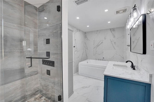 bathroom featuring vanity, plus walk in shower, and tile walls