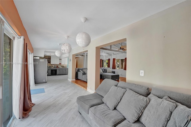 living room with light hardwood / wood-style flooring