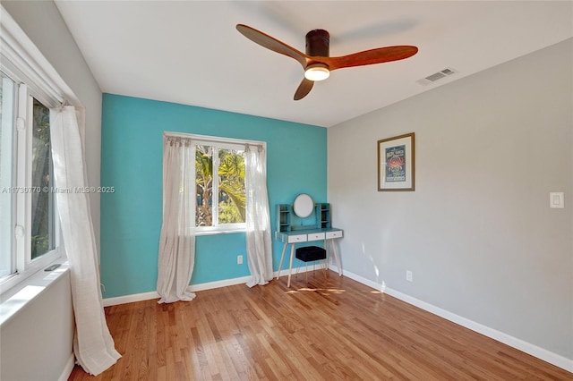 interior space featuring ceiling fan and light wood-type flooring