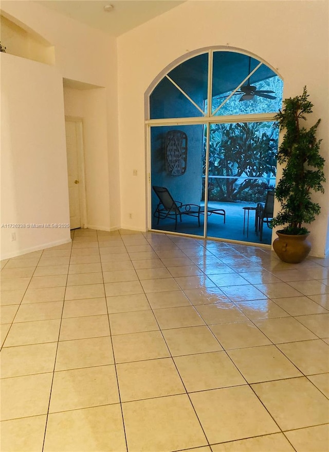 10495 S Utopia Cir S, Boynton Beach, FL 33437 - tiled spare room with ceiling fan