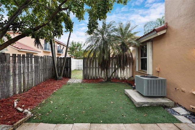 view of yard featuring central AC unit