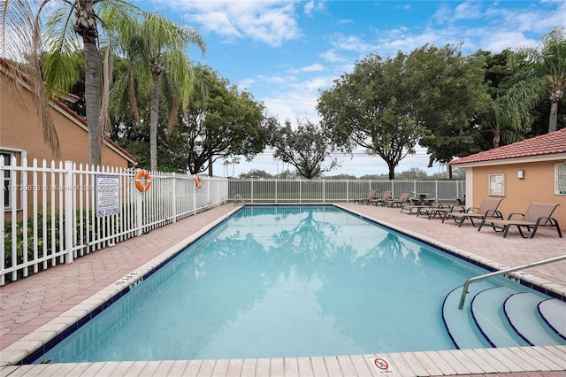 view of pool with a patio area