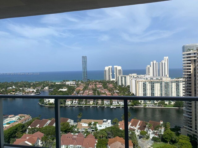 balcony featuring a water view