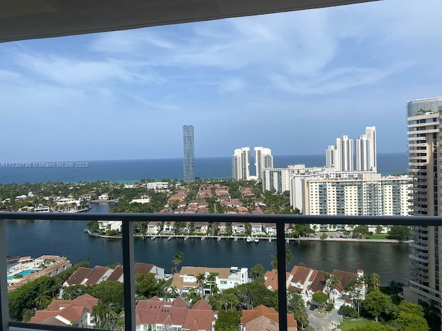 balcony featuring a water view