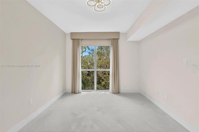 corridor featuring light tile patterned flooring