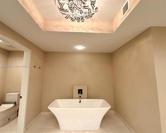 full bathroom featuring vanity, toilet, tile patterned floors, and separate shower and tub