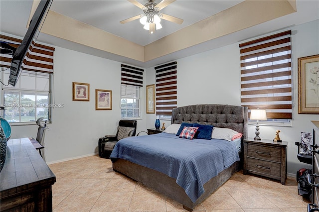 tiled bedroom with ceiling fan