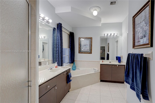 bathroom with vanity, separate shower and tub, and tile patterned flooring