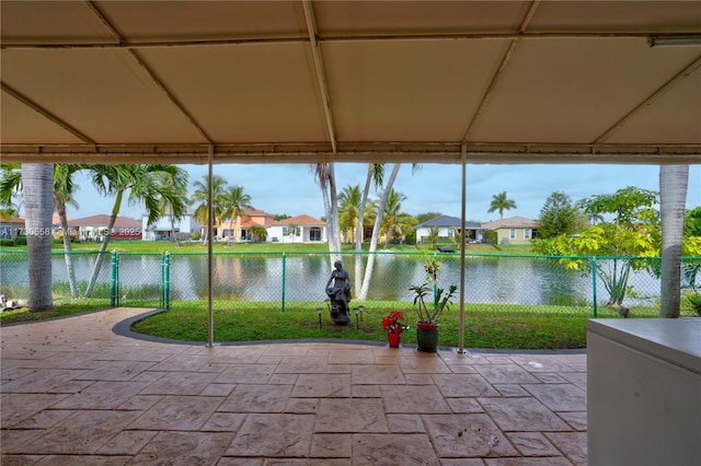 view of patio featuring a water view