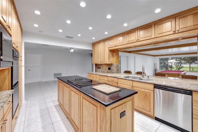 kitchen with a center island, dishwasher, a sink, light brown cabinets, and black electric cooktop