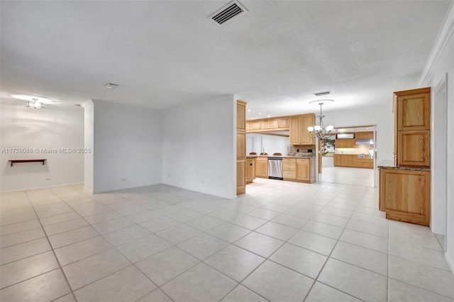 unfurnished living room featuring light tile patterned floors, a notable chandelier, and visible vents