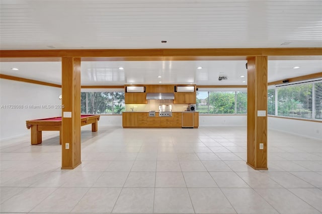 interior space featuring billiards, recessed lighting, exhaust hood, light tile patterned flooring, and brown cabinets